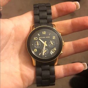 Michael Khors Black and Gold watch